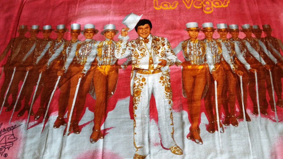 Liberace and the Rockettes Las Vegas Beach Towel