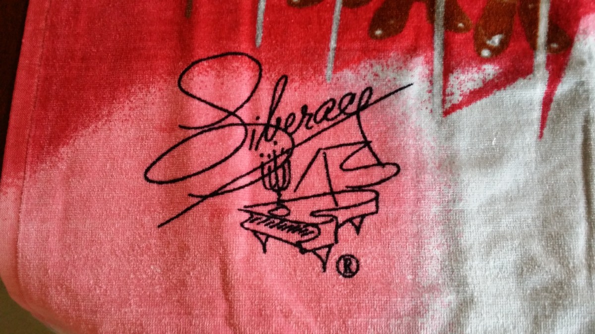 Liberace Trademark Signature on Rockettes beach towel